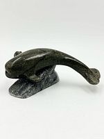 Left front view of full soapstone narwhal on base