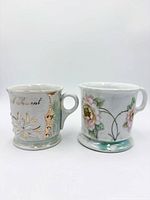 Both shaving mugs side by side showing overall designs and size comparison
