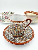 All three teacup and saucer pairs front view