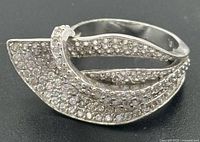 Front view showing wave design and pavé stones