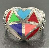 Front view of heart-shaped multi-stone inlay ring
