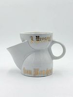 front view showing inscription and overall form