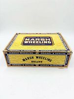 Closed view of top of cigar box showing branding