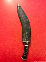 Kukri in scabbard full view