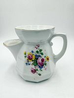 Front view showing floral bouquet decal and overall form