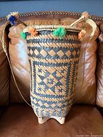 Front view showing geometric weave and tassels