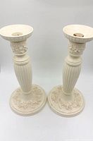 Full view of both creamware candlesticks front