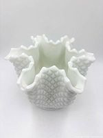 Side view showing hobnail pattern and ruffled rim