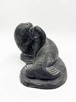 Front angled view showing full carving of adult walrus and pup