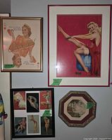 Overall view showing all four framed pieces on wall