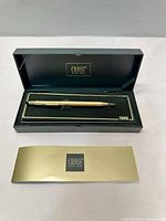 Pen in open Cross case with booklet displayed