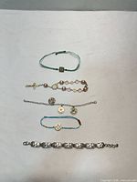 All five bracelets laid out for overview