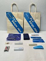 Full lot overview showing all airline memorabilia items