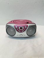 Front view showing speakers, LCD, control buttons