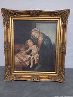 Full view of framed reproduction painting and ornate gilt frame
