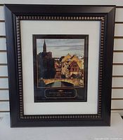 Full view of framed print showing frame style and mat