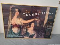 Full view of framed La Cenerentola poster in gold-tone frame