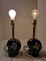 Front view showing both helmet lamps with bulbs lit/off