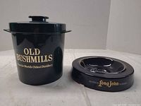 Ice bucket and ashtray side by side showing branding