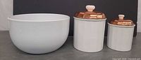 front view of mixing bowl and two canisters