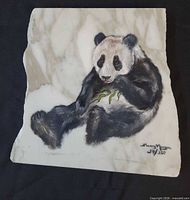 Front view showing painted panda and signature