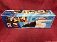 Front of sealed retail box showing Hurricane Wet & Dry Power Vac image and branding