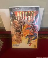 Front view of bagged Batman/Superman #30 comic