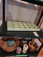 All items on shelving showing tray, tins and baskets