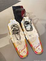 Snowshoes and boots full view