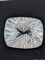 Close-up of the fantasy-cut blue topaz face