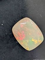 Loose cushion opal showing play-of-colour