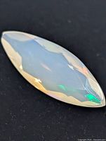 Marquise faceted opal gemstone close-up