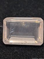Front view of rectangular faceted rose quartz