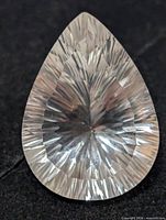 Front view of pear-shaped white topaz showing radial faceting
