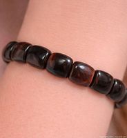 Bracelet worn on wrist showing bead color and fit