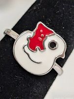 Front view of silver ring showing enamel bird design