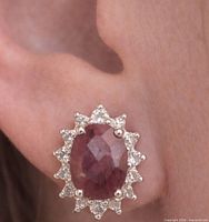 earring worn on ear showing size and style