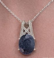 Necklace on display showing pendant and chain