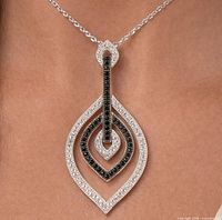 front view of necklace worn, showing pendant and chain