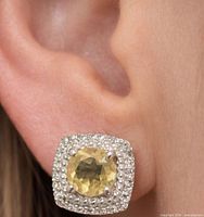 earring on ear showing size and design