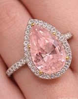 Ring on finger showing overall design and scale