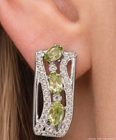 Earring worn showing size and design