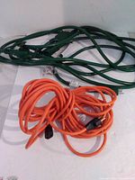 Both cords coiled, showing overall appearance