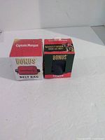 Both boxed Captain Morgan promo items side-by-side