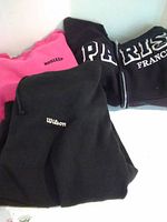 Group view of three sweatshirts stacked