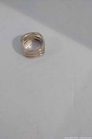 Square sterling silver ring angled view