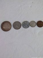 All five 1945 Canadian coins in a row