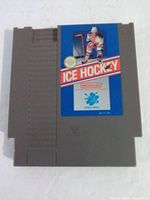 Front view of Nintendo NES Ice Hockey cartridge showing label and title