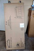 Front of sealed shipping box showing OSHome logo and bench illustration