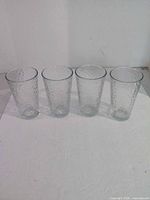 Front view of all four matching pebbled glasses